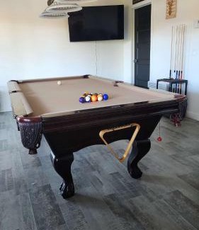 Saint-Prosper Ski Chalet | Lake and Pool table - The Dorchester