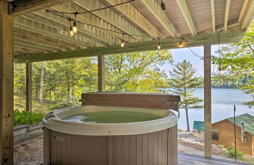 Lake Township Cabin | Lake Cabin in Honor w/Hot Tub, Dock & Sauna!