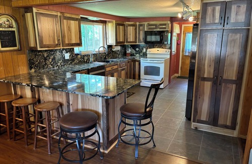 Eagle River Cabin | Lake front cabin on the Eagle River chain. Pet friendly. Pontoon for rent.