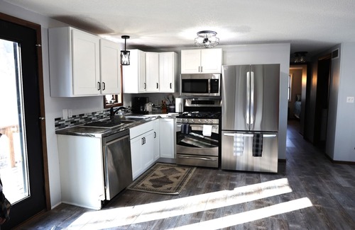 Arnolds Park House | Lake front, HUGE yard and deck, walking distance to the heart of Okoboji