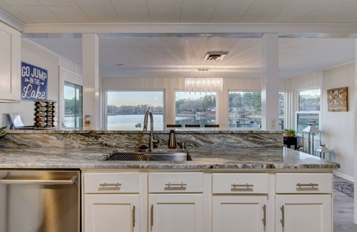 Mid America House | Lake Front Property/Hot Tub/Huge Deck/Game Room/Boat Ramp & Dock!