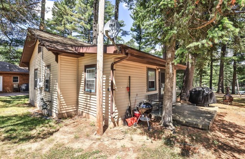St Germain Cabin | Lake view, dog-friendly cabin with porch & shared dock, swimming area, firepit