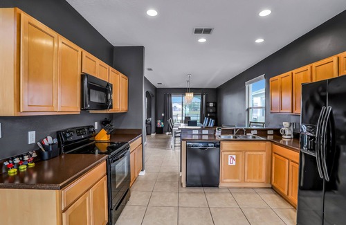 Crystal Cove House | Lake-view home with screened pool & private lanai + clubhouse pool & playground