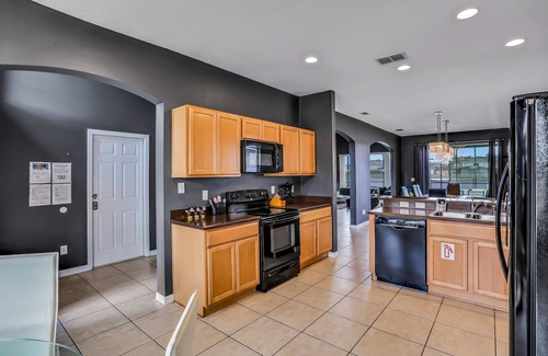 Crystal Cove House | Lake-view home with screened pool & private lanai + clubhouse pool & playground