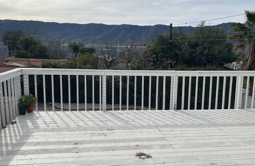 Lake Elsinore House | Lake view, pool, putting green