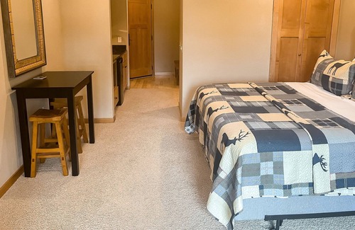 Three Lakes Condo | Lake-view studio with hot tubs, heated indoor pool, tennis, gym, grills, firepit