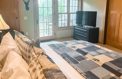 Three Lakes Condo | Lake-view studio with hot tubs, heated indoor pool, tennis, gym, grills, firepit