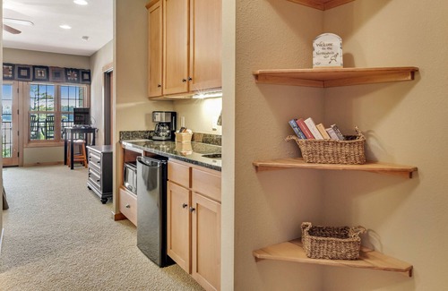 Three Lakes Condo | Lake-view studio with hot tubs, heated indoor pool, tennis, gym, grills, firepit