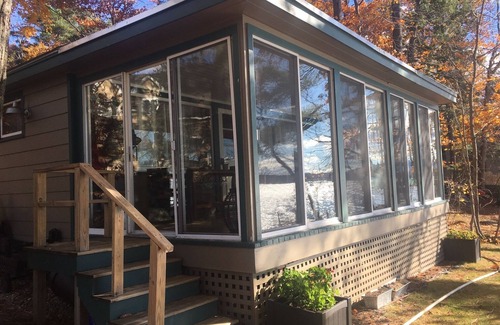 Meredith House | Lake Winnipesaukee lakefront cottage with private coveand 300' of lake frontline