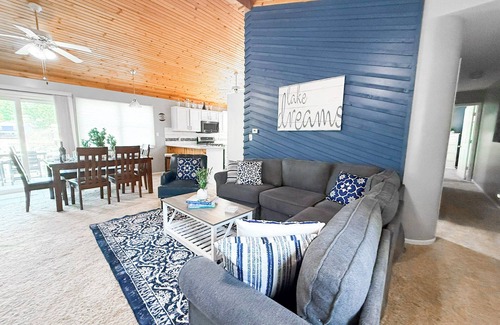 Sunrise Beach House | Lakefront 3BR, 2BA home in coveted cove near Margaritaville and Paradise. Features private dock with sundeck, decks with grill and firepit, gourmet kitchen, kayaks, WiFi, and pet-friendly fun. Quiet Cove minutes from the Action.