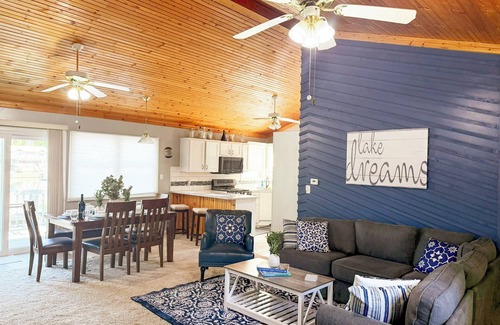 Sunrise Beach House | Lakefront 3BR, 2BA home in coveted cove near Margaritaville and Paradise. Features private dock with sundeck, decks with grill and firepit, gourmet kitchen, kayaks, WiFi, and pet-friendly fun. Quiet Cove minutes from the Action.