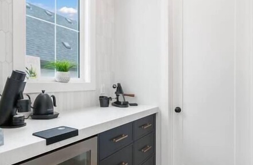 Southeast Calgary House | Lakefront | 4 Bedroom | Gym + Theatre + Garage |