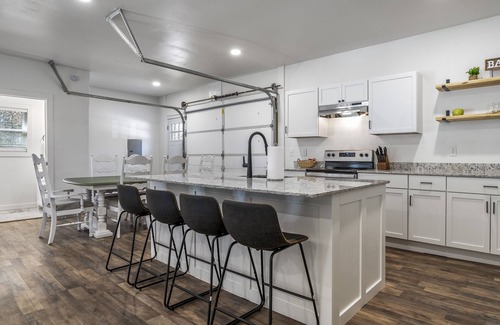 Garfield House | LAKEFRONT Bliss FLAT to water: Spacious home with Game Room, Sleeps 15 Guests!