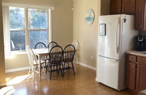Jacksboro Cottage | Lakefront Cabin in quiet cove. No steps to private boat slip. Pet friendly.