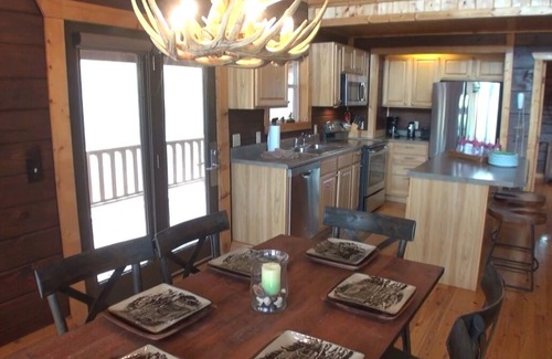Gatlinburg - Pigeon Forge Cabin | Lakefront Cabin with Outdoor Pool, Close to Pigeon Forge.