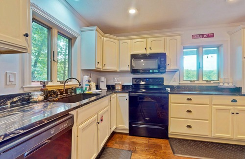 Dandridge Cabin | Lakefront Cabin with private dock, kayaks, fire pit, New hot tub, and cigar room
