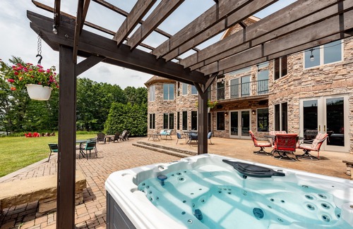 Waterfront Greens House | Lakefront Castle w/Pool, Hot Tub & Dock Slip