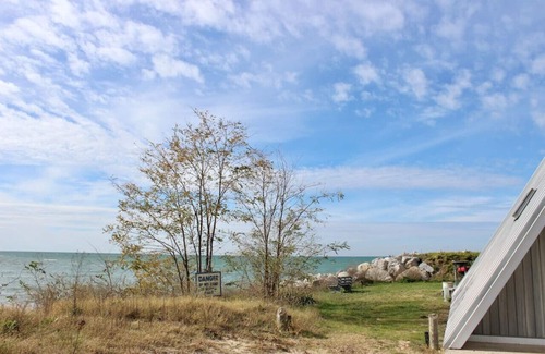 Stevensville House | Lakefront Chalet #1 with Beach Access, Pools, Sport Courts, Fishing Pond & more!