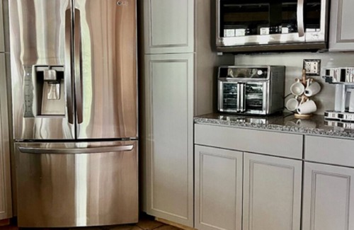 Greentown House | Lakefront Chateau Oasis