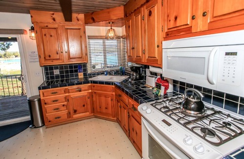 The Village House | Lakefront Cottage - Trip Advisor Certificate of Excellence winner with gorgeous lake views!