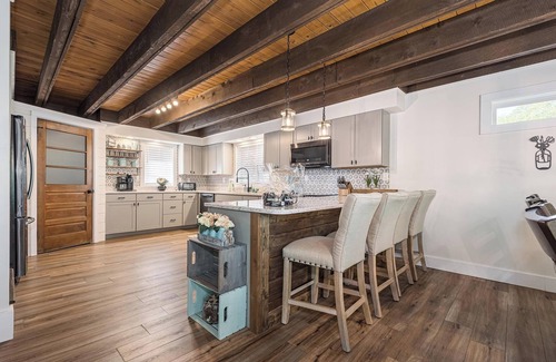 Oakland House | Lakefront, dog friendly, dock slip, hot tub, and fire pit
