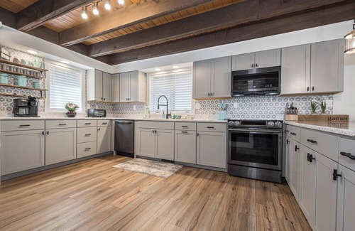 Oakland House | Lakefront, dog friendly, dock slip, hot tub, and fire pit