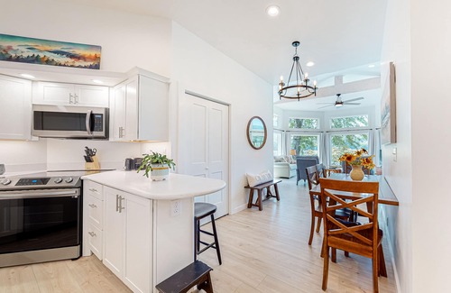 Lake Lure Cottage | Lakefront dream stay with dock, three kayaks, paddleboard, & grill - near golf