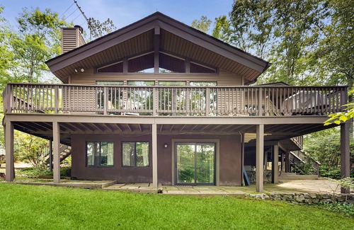 Blue Water House | Lakefront Escape with Private Docks, Three-Season Room, and Spacious Bunk Room