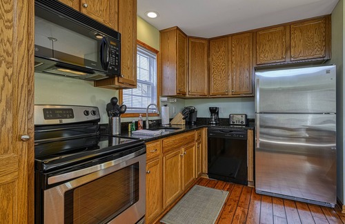 Bumpass House | Lakefront Gem W/Private Hot Tub, Firepit, Large Deck, Game Room & Fast WiFi