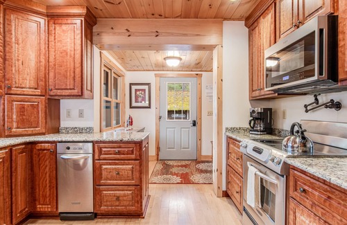 Manitowish Waters House | Lakefront home in a great location with docks, private beach, sauna & firepit