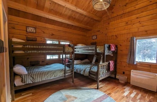 Lake Clear Cabin | Lakefront Home and Boathouse on Lake Clear