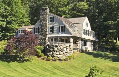 New Preston House | Lakefront Home set on five acres of land, deck, patio, lounge seating by...