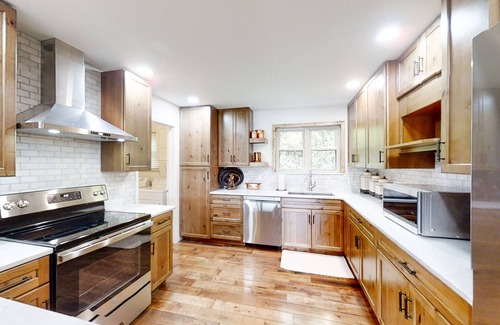 Rock Harbor Cabin | Lakefront home with amazing views, grill, fire pit, private dock, & AC