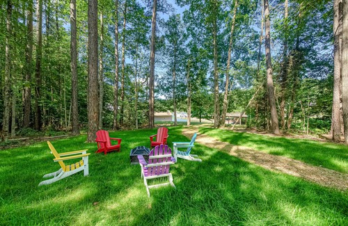 Bumpass House | Lakefront home with boat mooring, deck, hot tub, game room & fast WiFi - dogs OK