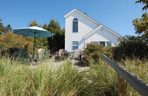 Empire House | Lakefront home with firepit, grill & furnished deck