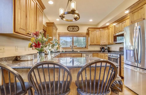 McHenry House | Lakefront home with fire pit and dock Near Wisp Resort