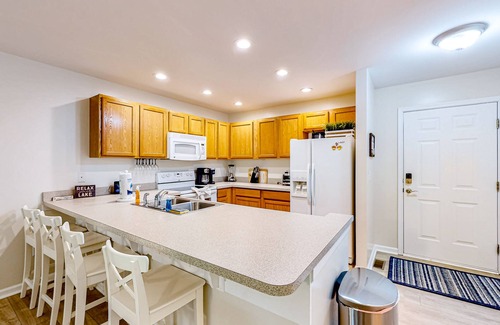 Mineral House | Lakefront home with kayaks, private patio, air hockey, grill, & balcony