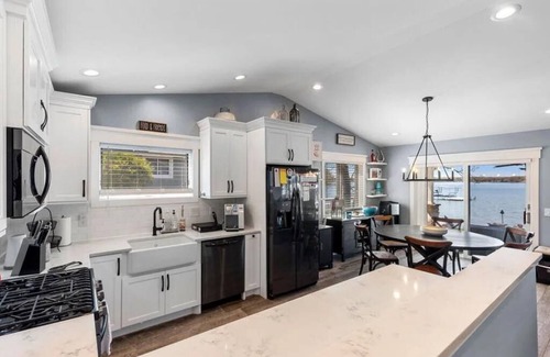 Sister Lakes House | Lakefront home with private dock and firepit - Sleeps 12 | Magician Lake Breeze