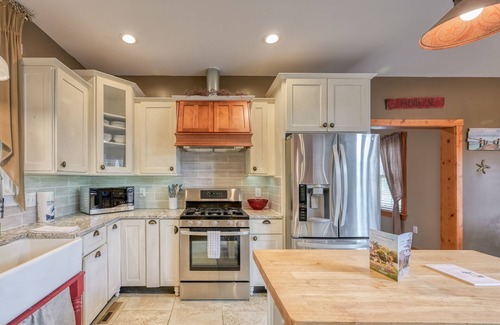 Bumpass House | Lakefront home with private hot tub, dock, grill, game room, lake views & kayaks