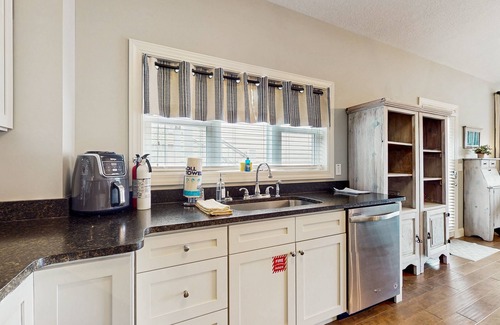 La Follette House | Lakefront home with decks, shared pool, clubhouse, golf close by, Wi-Fi
