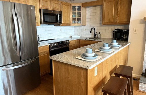 Pocono Lake House | Lakefront - Hot Tub, AC, 7 Paddleboards, Canoe, Kayak, Golf Car, Fire Pit, Boat