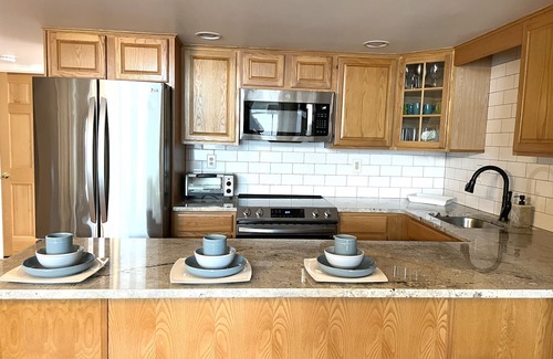 Pocono Lake House | Lakefront - Hot Tub, AC, 7 Paddleboards, Canoe, Kayak, Golf Car, Fire Pit, Boat