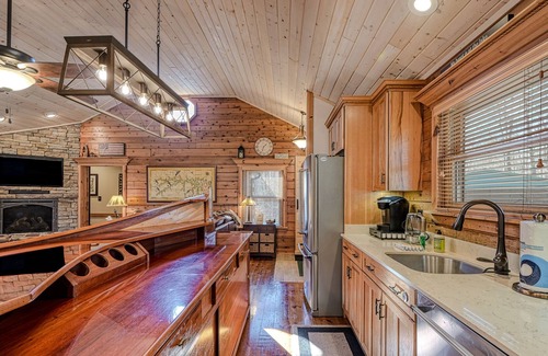 Mineral House | Lakefront living with direct beach access, two docks, boat house, firepit, & bar