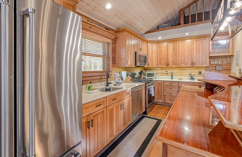 Mineral House | Lakefront living with direct beach access, two docks, boat house, firepit, & bar