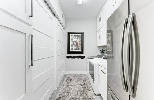 Braden River House | Lakefront Luxury Pool Spa Gym - Private Home with resort-like surroundings