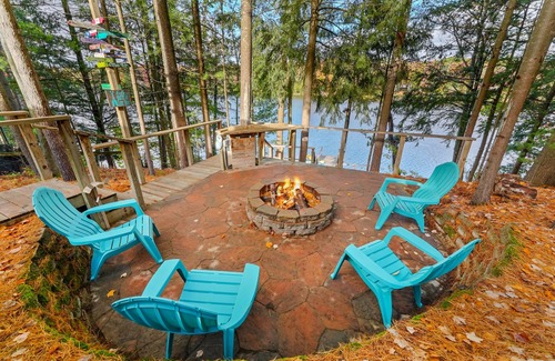 South Boardman House | Lakefront retreat 30 min to Traverse City. Hot tub, fire pit, kayaks, game room.