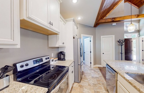 Lake Lure House | Lakefront retreat with private beach, games, dock & kayaks