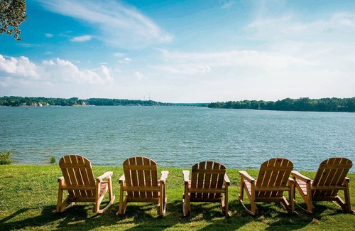 Steele Creek Cabin | Lakefront Two Bedroom Cabin #14 at Long Cove Resort with Two Porches & Panoramic Views by RedAwning