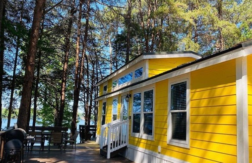 Steele Creek Cabin | Lakefront Two Bedroom Cabin #14 at Long Cove Resort with Two Porches & Panoramic Views by RedAwning