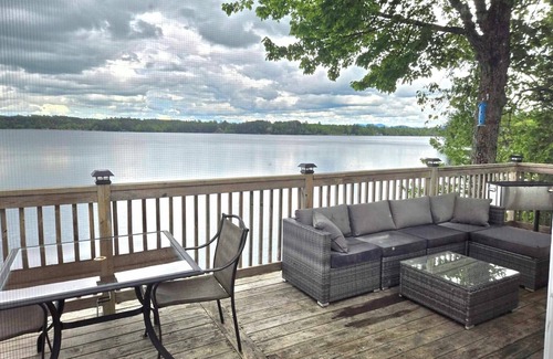 Brighton Cottage | Lakeside cottage gorgeous lake/mountain views. Cable/WIFI, large decks, 30' dock